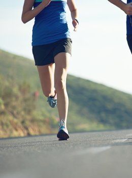 Two people out jogging. 