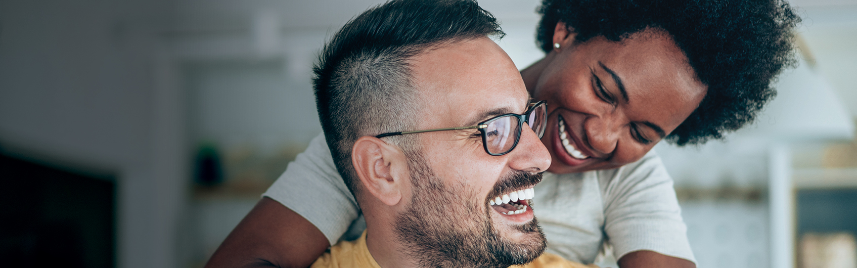 A photo of a smiling couple.