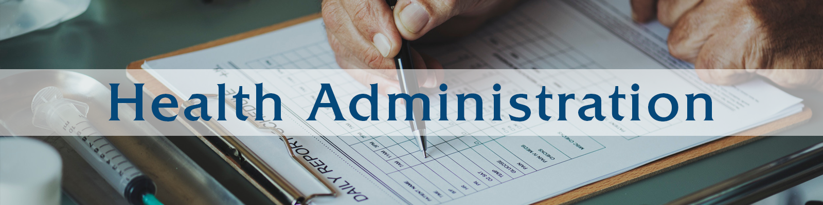 heatlth administaration hands on top of a desk writing on a clipboard 