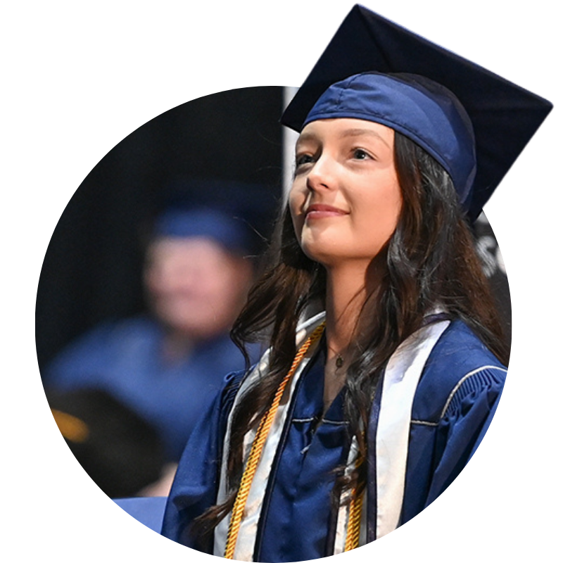 unf student in graduation outfit