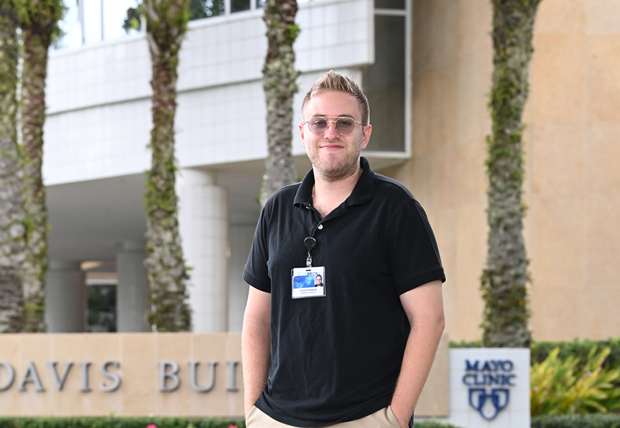 Conrad Testagrose standing in front of Mayo Clinic