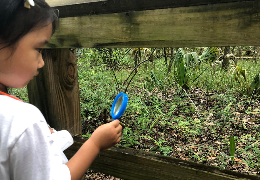 UNF Preschool student on nature trails