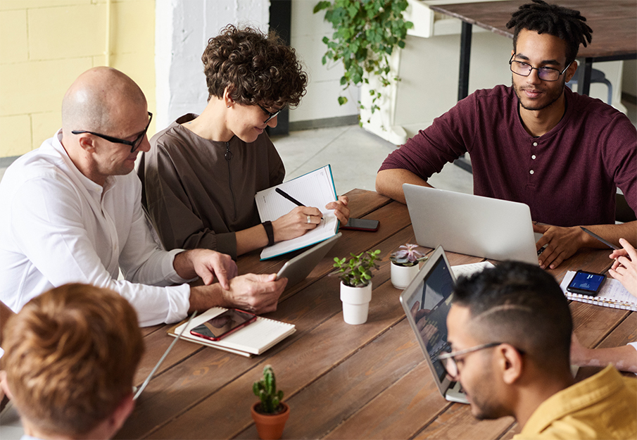 Professionals working together around a table