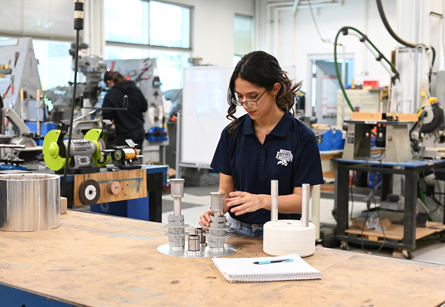 A women engineering student working in a lab