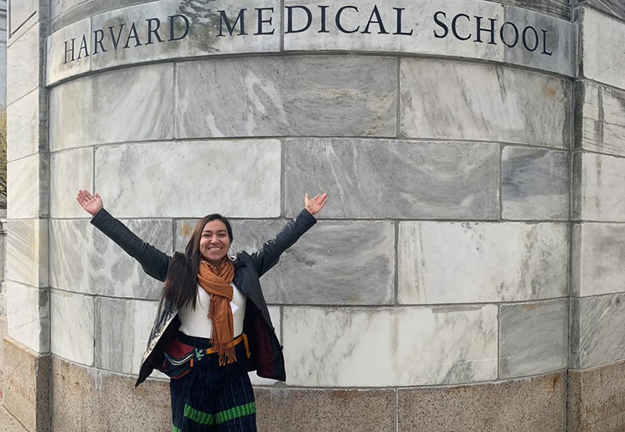 Maria Encinosa standing in front of Harvard Medical School