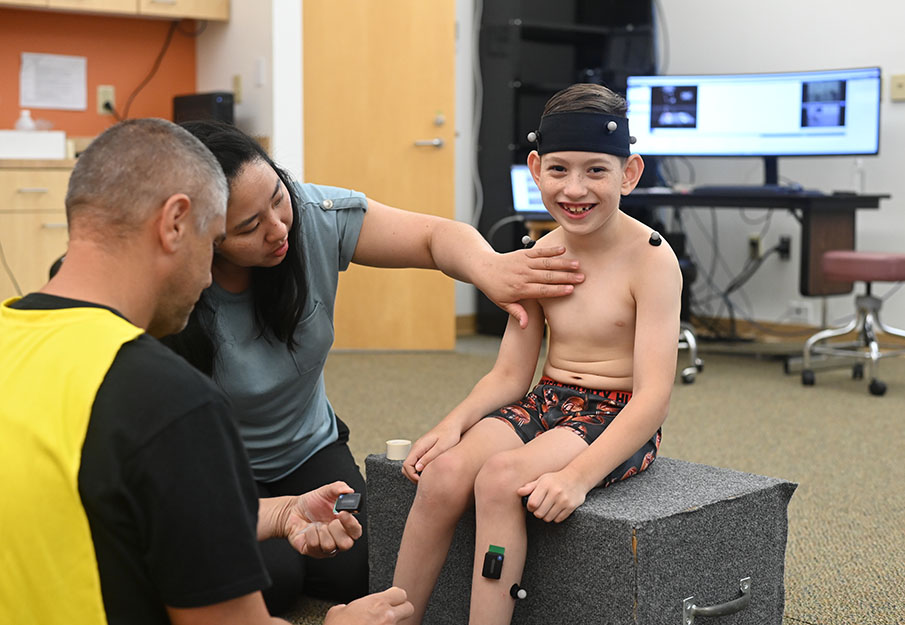 Finn Valentin participating in a power mobility clinical trial