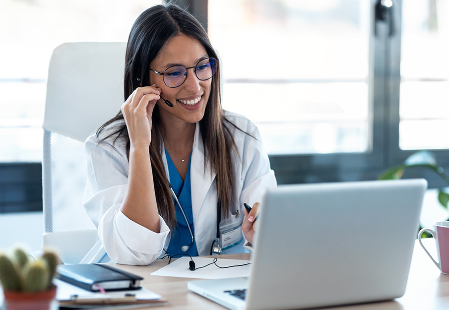 Health professional on a laptop