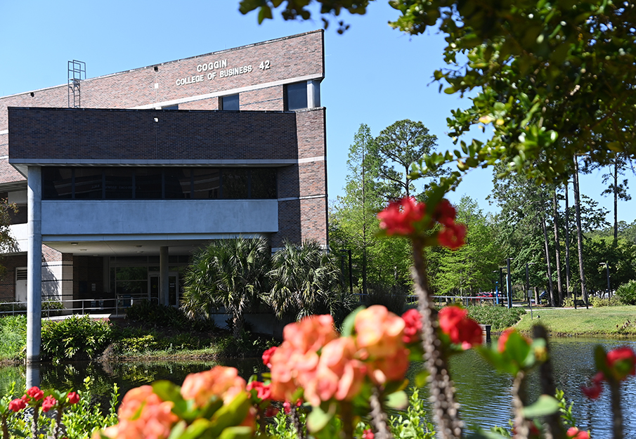 Outside view of the flowers around the Coggin building