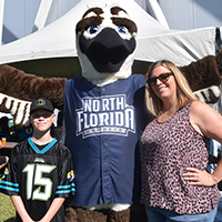 Ozzie at the Jaguars game with fans