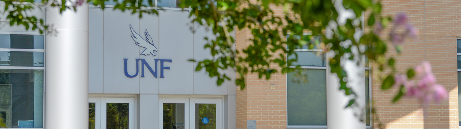 unf logo on the entrance of a building