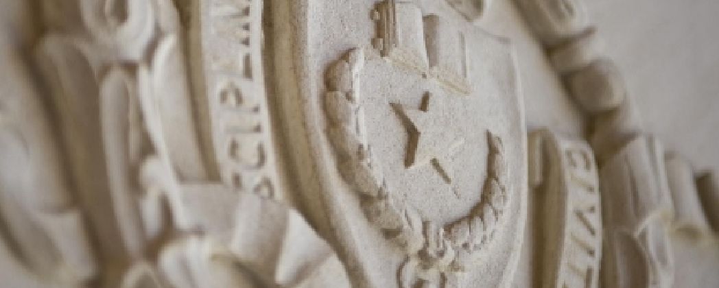 Seal of The University of Texas at Austin in stone