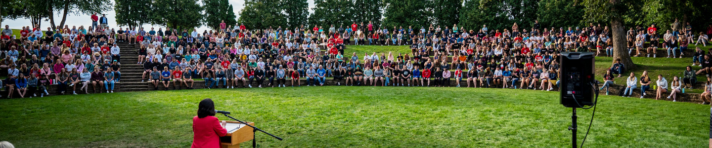 Chancellor Maria Gallo speaks to the new freshman class at Melvin Wall Amphitheatre during Week of Welcome