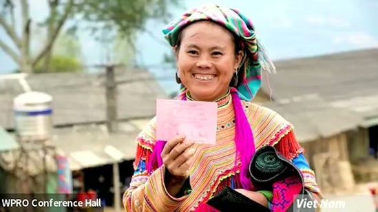 woman holding a vaccination certificate