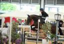 Sam Grindal competing in the Junior 90cm Championship Class