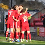 Swindon celebrate Smith's Gillingham equaliser