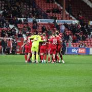 Swindon players prepare for extra time