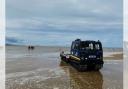 West Kirby RNLI's Hagglund BV206 is launched on West Kirby Beach during rescue of four people and dog from Middle Eye on Sunday (July 21)