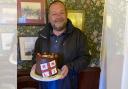 Tony Warburton, Hoylake RNLI Second Coxswain, was presented with a special RNLI cake to mark his retirement