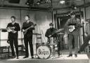 1.	This is a photo of John Lennon, Paul McCartney, George Harrison and Ringo Starr performing in the UK in the 1960s. See PA Feature TRAVEL Beatles. WARNING: This picture must only be used to accompany PA feature TRAVEL Beatles. PA Photo. Picture credit