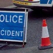 Car crashes into lamppost and garden wall on West Kirby street