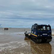 West Kirby RNLI's Hagglund BV206 is launched on West Kirby Beach during rescue of four people and dog from Middle Eye on Sunday (July 21)