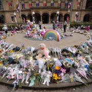 Flowers and tributes outside the Atkinson Art Centre Southport