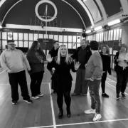 Cast during rehearsal for Wallasey Musical Theatre Company's production of 'Legally Blonde: The Musical'