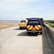 Library image of Wirral Coastguard Rescue Team vehicles near Leasowe Bay