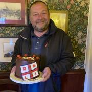 Tony Warburton, Hoylake RNLI Second Coxswain, was presented with a special RNLI cake to mark his retirement