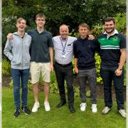 Wirral Grammar School for Boys students Lucas, Elliott, Alfie and Josh with Hospice volunteer manager, Phil McGraa,(centre) during voluntary work experience at Wirral Hospice St John's