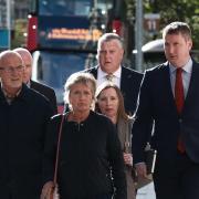 The family of Pat Finucane (left-right), Seamus Finucane, Geraldine Finucane, Katherine Finucane and John Finucane, arrive at Erskine House in Belfast to meet Northern Ireland Secretary Hilary Benn to discuss the murder of solicitor Pat Finucane in 1989