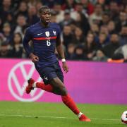 France’s Paul Pogba runs with the ball during an international friendly against Cote d’Ivoire at the Velodrome stadium in Marseille, France, in March 2022 (Daniel Cole/AP)