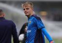 Kie Plumley warms up for Oxford United