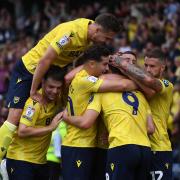 Oxford United players celebrate against Norwich City