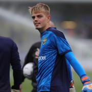 Kie Plumley warms up for Oxford United