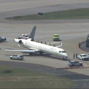 A damaged plane at Hartsfield-Jackson Atlanta International Airport after colliding with another plane on a taxiway (WSB via AP)