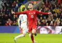 Liam Cullen celebrates the first of his two goals in Wales’ 4-1 Nations League victory against Iceland (Nick Potts/PA)