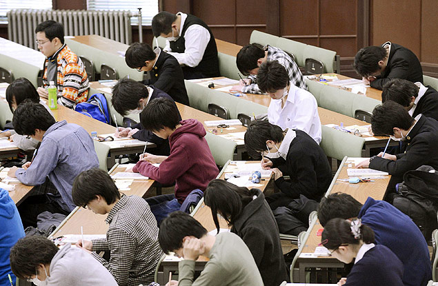 In this January 2013 photo, preparatory students sit for National Center Test for University Admissions at the University of Tokyo. Students from Shanghai, Hong Kong, Singapore, Taiwan, Japan and South Korea were among the highest-ranking groups in math, science and reading in test results released Tuesday, Dec. 3, 2013 by the Program for International Student Assessment (PISA) coordinated by the Paris-based Organization for Economic Cooperation and Development (OECD). The group tests students worldwide every three years. In Japan, the government added 1,200 pages to elementary school textbooks after its children fell behind in those in rivals such as South Korea and Hong Kong in 2009, although Japan’s scores for 2009 were tops for rich industrialized countries. Japan has since improved its standings in all three areas. (AP Photo/Kyodo News) JAPAN OUT, CREDIT MANDATORY ORG XMIT: TOK403