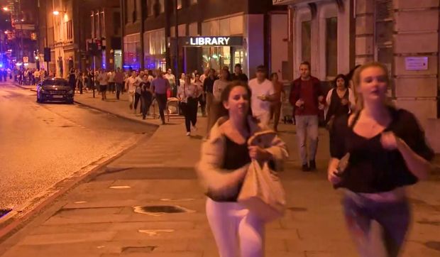 In this Saturday, June 3, 2017, image made from a video, people run from the scene an attack in London. The Borough neighborhood in London offered safety and a place to sleep for hundreds of people amid the chaos of Saturday night's attack in the heart of the city. (Sky news via AP) ORG XMIT: NYJK102