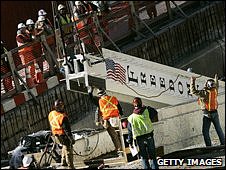 Raising of steel column marks start of construction of Freedom Tower, New York, Dec 06