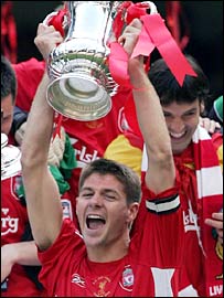 Liverpool captain Steven Gerrard lifts the FA Cup