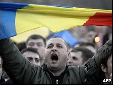 Protester with Romanian flag in Chisinau, Moldova, 7/4/09