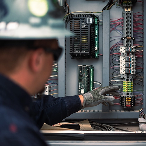 Mesa Generator Technician performing preventative maintenance on a natural gas generator.