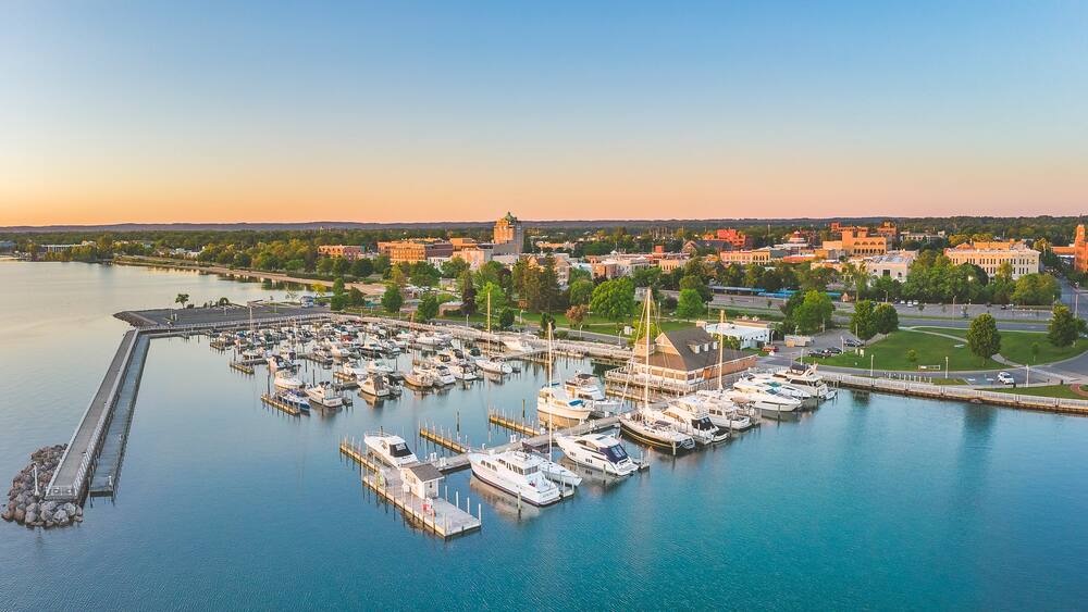 Traverse City which includes a sunset, landscape views and a bay or harbor