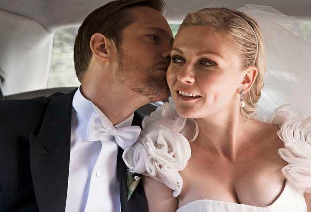 Whisper It: Kirsten Dunst plays a bride-to-be alongside Alexander Skarsgard in MelancholiaChristian Geisnaes