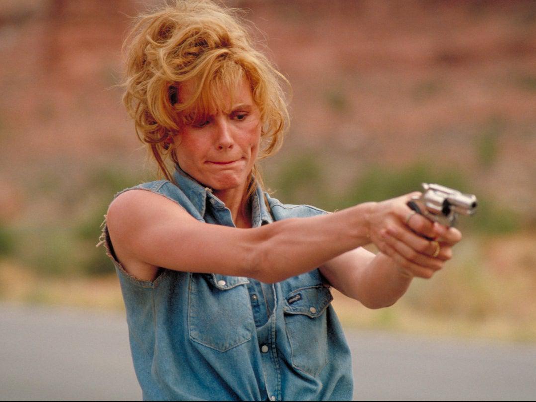 Geena Davis’s Thelma holds aloft a firearm in Thelma & LouiseMGM