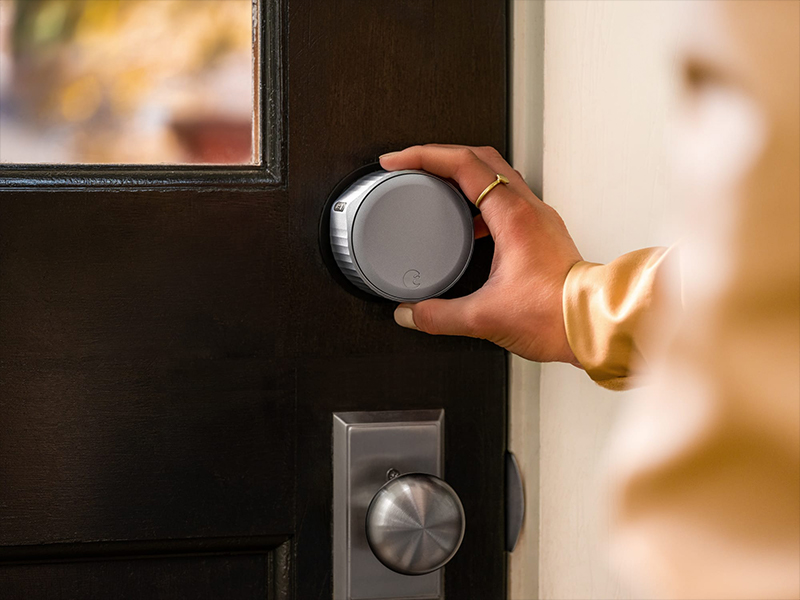 A hand opening an August Home Smart Lock that Bishop Fox performed mobile application penetration testing. August: Built-in Security in IoT Devices.