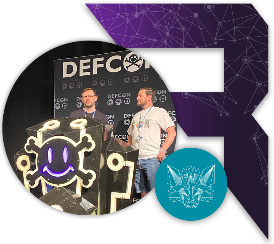 Two Bishop Fox Security Consultant standing at podium at Defcon.