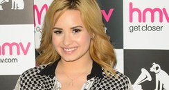 Demi Lovato attends alnum signing