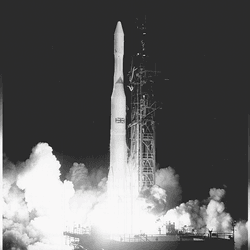 Black and white photograph of Skynet-1A being launched from Cape kennedy's Complex